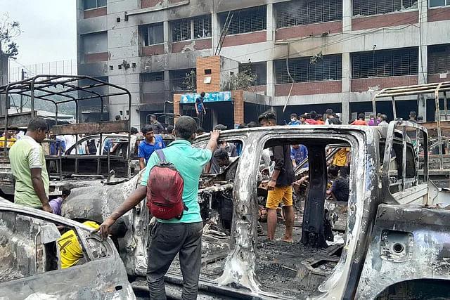 Burned vehicles in front of Jatrabari thana. The picture was taken on Tuesday afternoon.